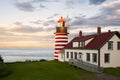 Sunset by Candy Cane Lighthouse in New England Royalty Free Stock Photo